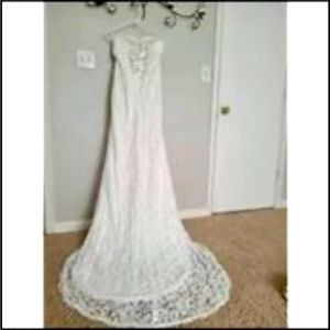 Wedding dress size 20W plus size beautiful lace up corset style dress off white